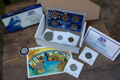 New York Coin Collector's Box with 2004 United States State Quarters proof set, Buffalo Nickel, Japanese 1 Yen coin, and Indian Head Penny