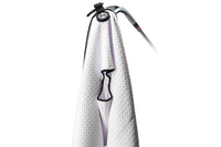 Pins and Aces magnetic golf towel shown attached to an iron. These are the perfect towels for your next round.