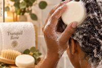Tranquil Rose handcrafted soap and bath products displayed with natural wood, botanicals and a rustic luxury spa aesthetic.