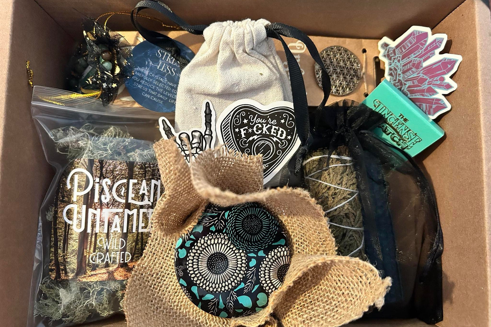 Piscean Untamed carefully curated subscription box with Wildcrafted locally foraged herbs, hand poured soy candle plus much more! 