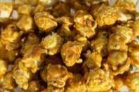 Indulge in Rich Caramel Corn, made with real butter for a perfectly sweet, crunchy, and buttery delight!