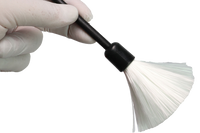 We see a basic latent fingerprint kit with brush powder and tape to lift latent fingerprints from surfaces