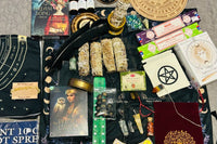 Smudge sticks, divination cloths, incense, incense holders, Oracle decks, tarot decks, feather, tarot pouch
