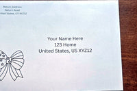 White envelope with printed sample U.S. mailing and return addresses, featuring a black outline patriotic bow design on the left.