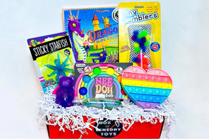 Dragon board game, rainbow Needoh, stick starfish, squish bear, tiny tumblers, heart bubble pop it fidgets