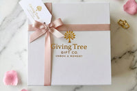 Our side packaging- sturdy magnetic gift box with gold foil logo, grosgrain ribbon and gold foil gift tag. 