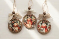 Handcrafted vintage-style wooden ornaments featuring art paper designs, finished with rustic details
