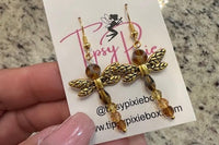 Dragonfly dangle earrings.