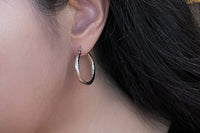 Sick of fast-fashion jewelry? Get a fresh pair of unique, designer sterling silver earrings delivered to you every month. Each piece is its 