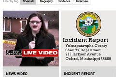 A reporter with microphone stands in front of home for a live news report at the crime scene, a brick home.