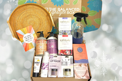 The Balanced Lifestyle Box for women showcases self-care products and a reusable tote bag for wellness journeys