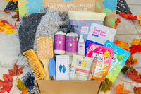 The Balanced Lifestyle Box for women showcases self-care products and a reusable tote bag for wellness journeys