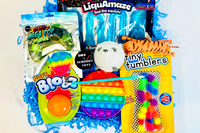 Fidget Box
• Liquamaze Squish
• OMG Mega Pop Mini
• Blobz
• Rainbow Pop It
• Woo Puff 
• Tiny Tumblers
• Pen Pop It OR Stretch Tiger