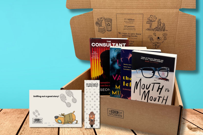 Brown box filled with fiction books, showcasing a variety of gripping titles and intriguing covers, perfect for mystery lovers.