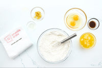 Apricot Cloud French Pastry from scratch baking kit featuring airy French pastry filled with vanilla pastry cream and apricot.