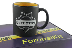 A blue box containing a forensikit is displayed in the back while a black detective mug is in the foreground
