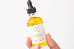 Grapefruit all natural VEGAN Body Oil: "Glass bottle of grapefruit body oil from the natural bath and body gift set."