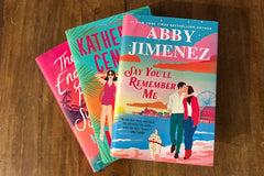 Three hardcover, contemporary romance titles by authors Hannah Brown, Abby Jimenez, and Katherine Center.