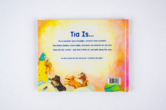 Back cover of Tía Is shows a warm watercolor landscape with Moshi and the other dogs inviting young readers into Tía’s world.