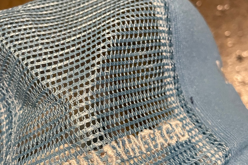 Comma, 'One Man's Trash' Trucker Hat