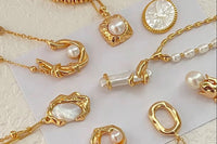 Liquid style drip gold pendants & pendants with pearls and pearl encrusted  mixed with gold pendants on 14k gold different style chains