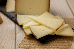 Mixed Milk Aged Cheese by La Reserva de Entrepinares.  It is a cheese with orange tones, roasted and fruity aromas, very mature. 5.3 oz