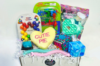 Dinosaur Wally Crawlys, Shape Shifters, Plush Coversation Hearts, esPop Fidgety Pop It, Needoh Stress Ball, squish cat, bubble pop