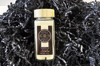 A jar of aromatic vanilla sugar from Spice Wheel—perfect for coffee, baking, or adding a sweet floral touch to your favorite treats.