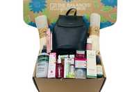 The Balanced Lifestyle Box for women showcases self-care products and a reusable tote bag for wellness journeys