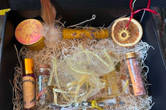 A beautiful Litha Sabbat Offering from 2025, Beeswax dressed candle, ritual oil, loose incense, ritual salt, solar talisman + more