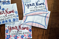 Three hand-decorated patriotic envelopes with red and blue stars, swirls and stripes, featuring handwritten sample names and U.S. addresses.