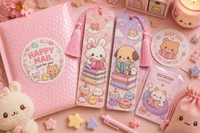 Kawaii bookmark subscription featuring two pastel animal reading bookmarks, a matching sticker, cute package, and bookish surprise.