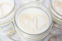 Each candle in our Signature Collection is crafted with our logo embedded in the wax for an added touch of luxury.