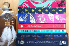 Pile of our chosen books of the month displayed on top of eachother showing the sprayed edges .this shows the kind of books we choose 
