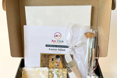 Close up of the Teens and Adults art box with a stretched canvas, Klimt guide, oil paints and real gold leaf sheets