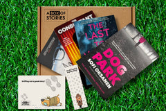 Brown box filled with crime thriller books, showcasing a variety of gripping titles and intriguing covers, perfect for mystery lovers.