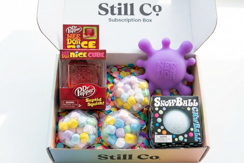 Subscription box for tween girls with squishy toys and other items to hep de-stress. The perfect gift.  