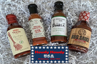 This picture contains four different styles of Texas! BBQ sauce that will arrive in your Texas! Chuckwagon food box.