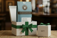 Box includes: 
one full-size  12oz bag of coffee , 
a themed lagniappe gift for the human 
and a sample treat for your furry friend