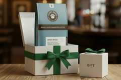Box includes: 
one full-size  12oz bag of coffee , 
a themed lagniappe gift for the human 
and a sample treat for your furry friend