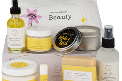 Bundle of All Products Displayed – "Flat lay of all-natural bath and body products from the Lizush gift box, featuring citrus soap, body scr