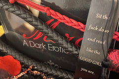 This deliciously dark book box includes a mix of dark romance & Halloween erotic horror books + a themed merch by Gothika Books.