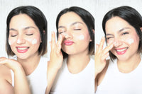 Woman applying Aster Lupine Seed and Rose Day Cream to face and under-eye area.