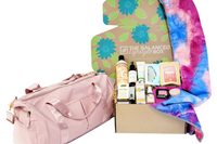 The Balanced Lifestyle Box for women showcases self-care products and a reusable tote bag for wellness journeys