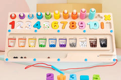 Picture of a Montessori Style wooden 3-in-1 Counting Board. One of the possible options for inclusion into the Toddler Toy Treasure Box. 