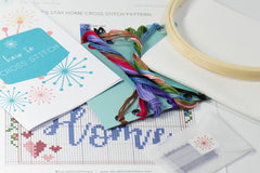 simple beginner friendly counted cross stitch craft diy supplies of thread, hoop, pattern, needle and tips