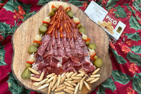 This Charcuterie tree is an example of what you can do with your Merry Tapas Box full of Iberico flavor, sweet pickle banderillas and turron