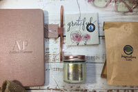 - ActionPlanner 
- 12oz Bag of Coffee 
- Coaster 
- Candle
- Pen 

*Items varies and theme changes. 