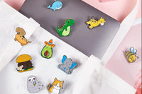 From the animal genre. Pins displayed in this image contain sloths, elephants, bees, dinosaurs, whales, and more! 