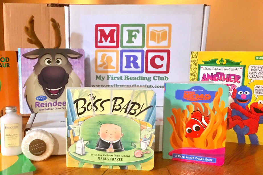A My First Reading Club subscription box surrounded by a Sven toy, a Boss Baby book, a Finding Nemo book and more.